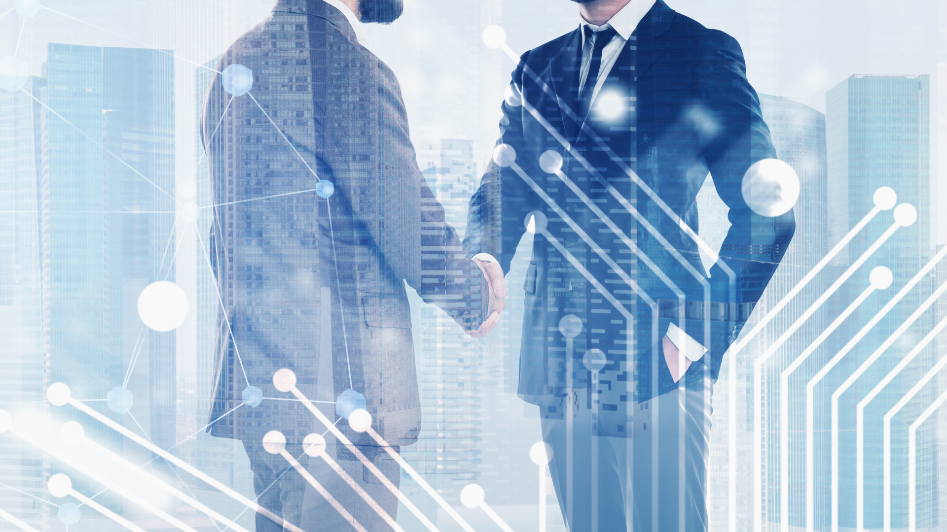 Two businessmen are shaking hands in front of a city skyline.