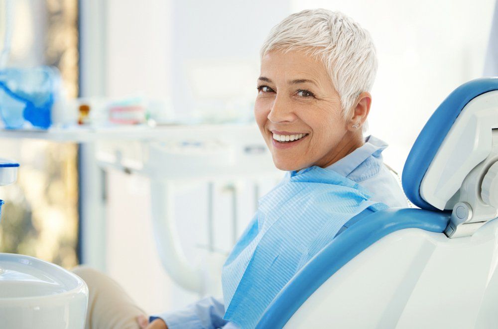 Smiling Woman After Dental Appointment — Lenoir, NC — Wayne Hollar DDS