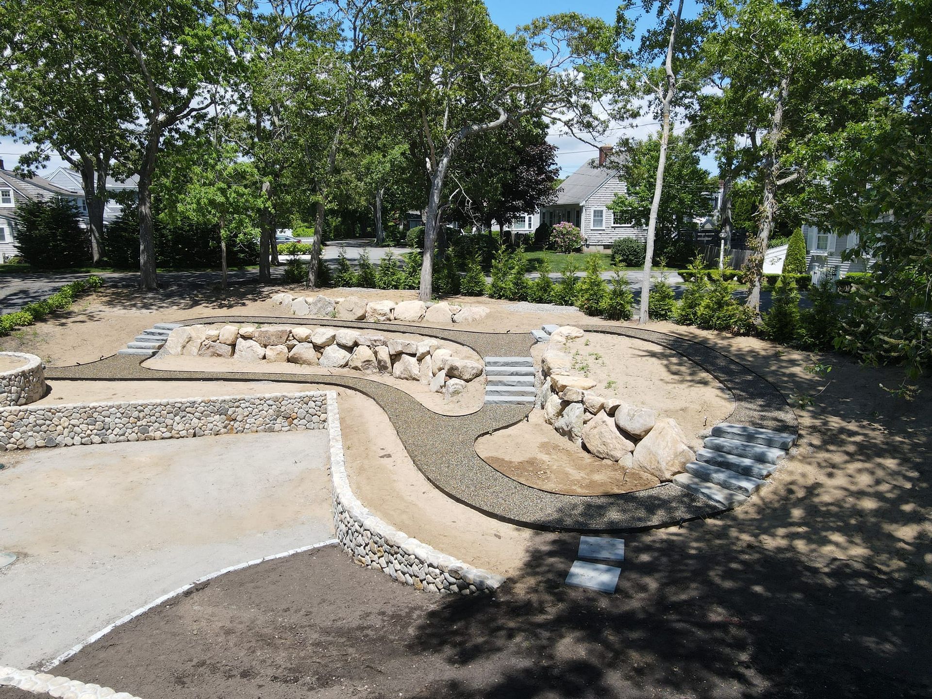 A park with a lot of rocks and trees in it
