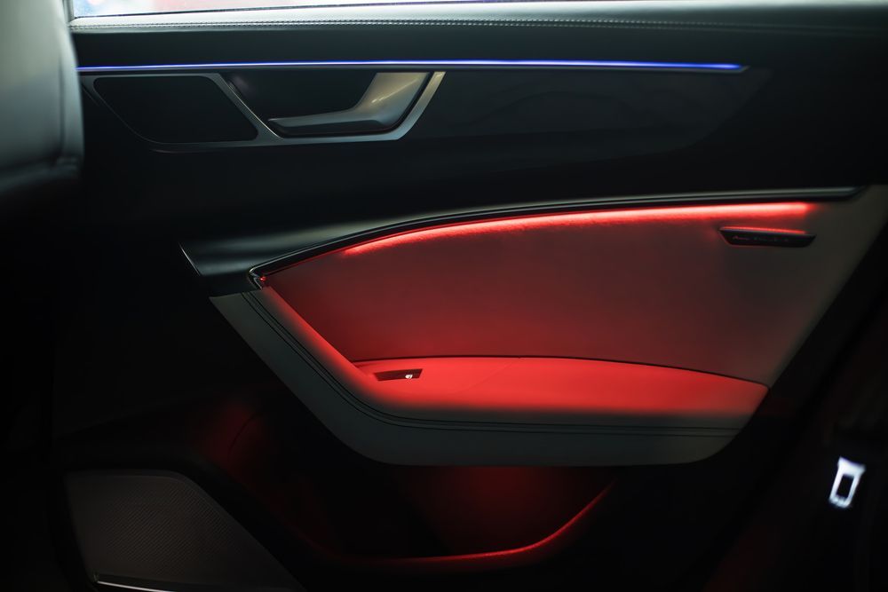 Car Door Interior With Blue and Red Led Lighting — Norm Beatty's Auto Electrical Service In Long Jetty, NSW