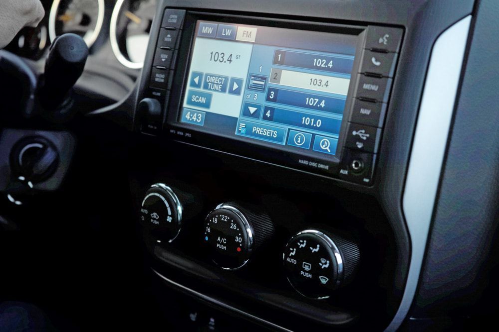 Car Interior Showing a Touchscreen Radio — Norm Beatty's Auto Electrical Service In Long Jetty, NSW