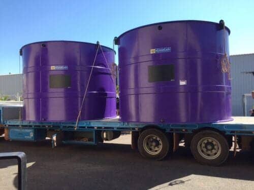 Large Purple Tanks on Flatbed Truck — Plastic Fabrication in Yarrawonga, NT