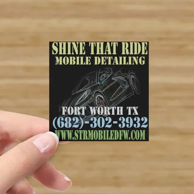 Shine That Ride Mobile Detailing business card with Fort Worth TX phone number and website on a hand-held black card