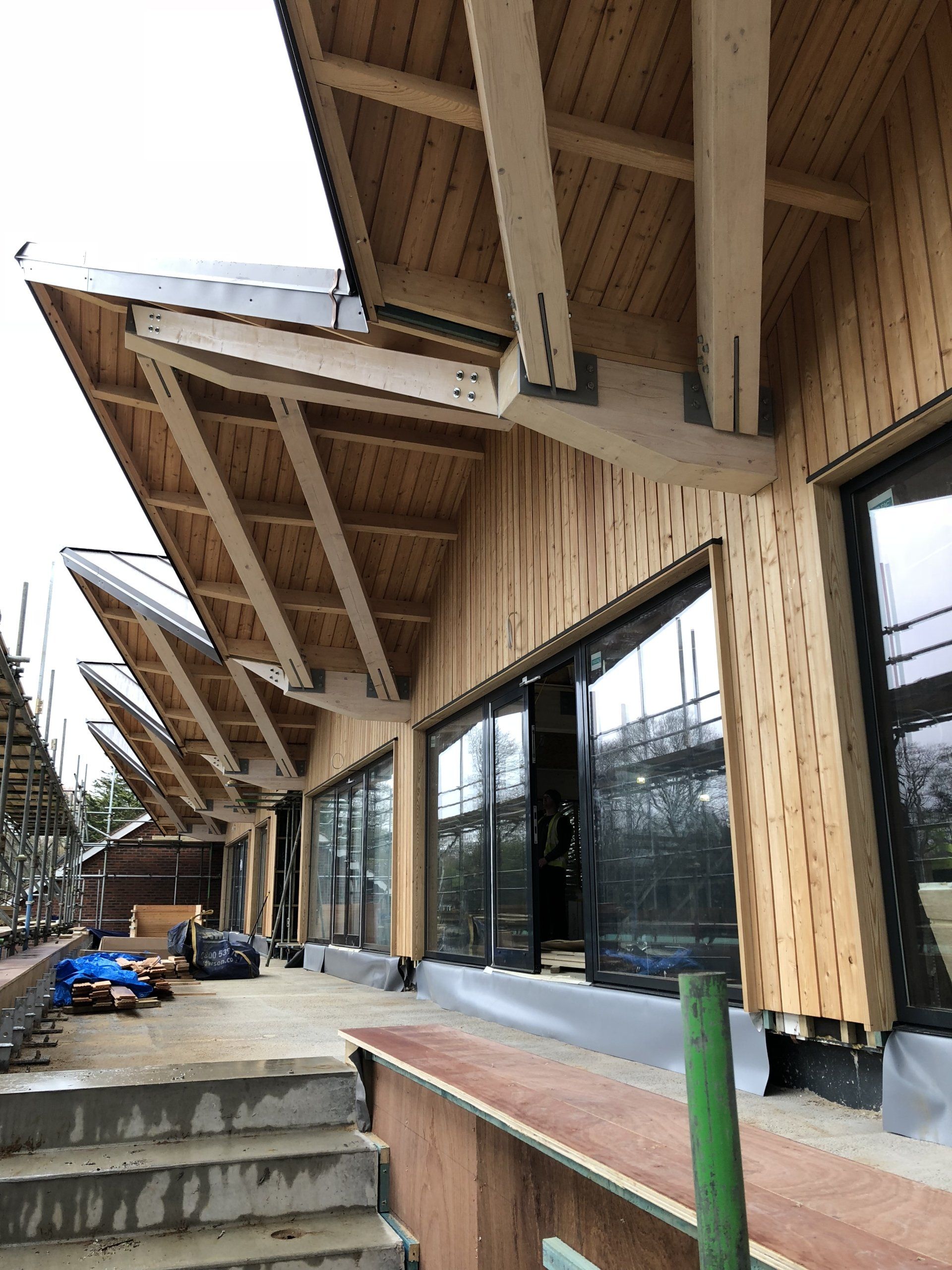 Cedar Cladding in Cranleigh, Surrey. Builder. Building contractor. Construction. Carpentry. Carpentry contractor. Extensions. New builds. Timber frame fabrication and erection. Design and build. Kitchen installations. Horsham. Surrey. Reigate. Redhill. Dorking. Crawley. West Sussex. Cranleigh.