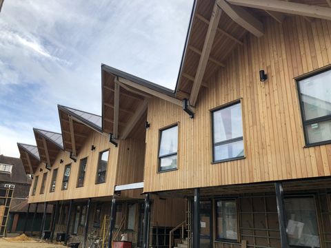 Cedar Cladding, Cranleigh Classrooms. Builder. Building contractor. Construction. Carpentry. Carpentry contractor. Extensions. New builds. Timber frame fabrication and erection. Design and build. Kitchen installations. Horsham. Surrey. Reigate. Redhill. Dorking. Crawley. West Sussex. Cranleigh.