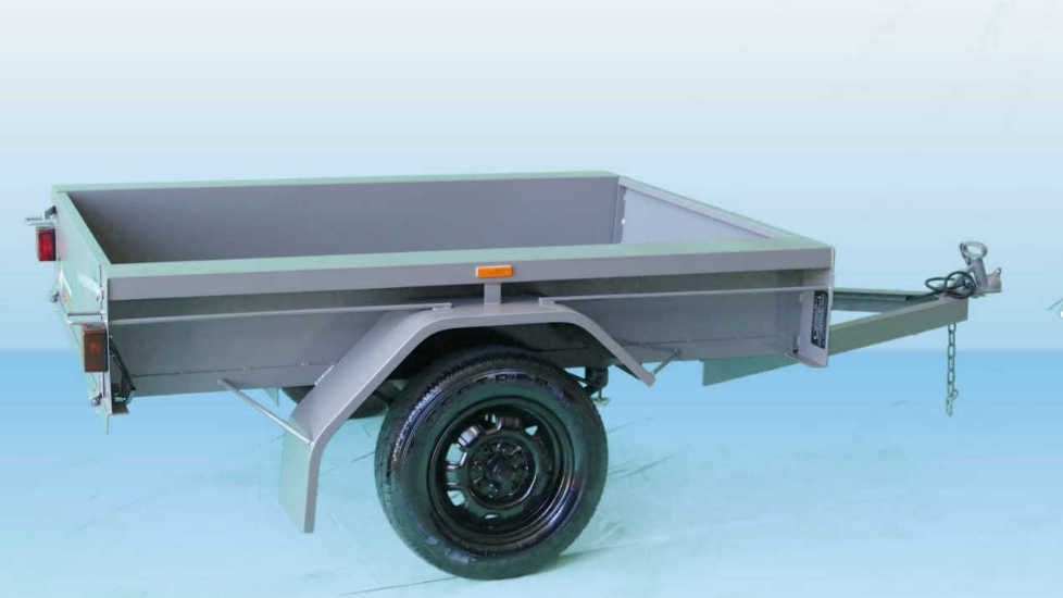 A small trailer is sitting on a blue surface, available for sale in Perth, Western Australia.