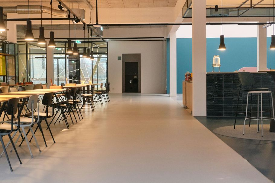 Scrabble tiles on a green rack spelling 