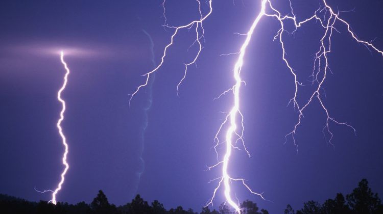 A couple of lightning strikes in the night sky