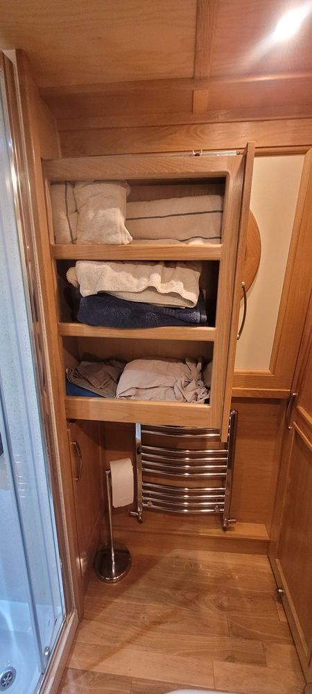 Bathroom sliding airing cupboard