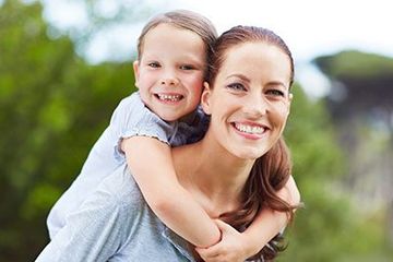Family Smiling with healthy teeth