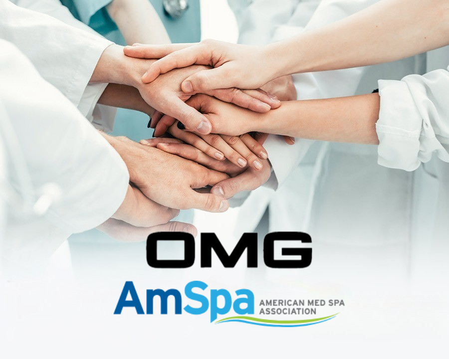 A group of doctors are putting their hands together.