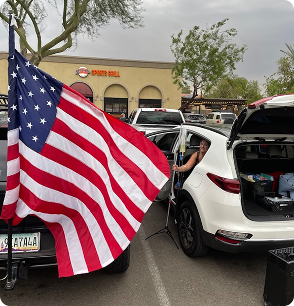 A car with a license plate that says ytala is parked in a parking lot