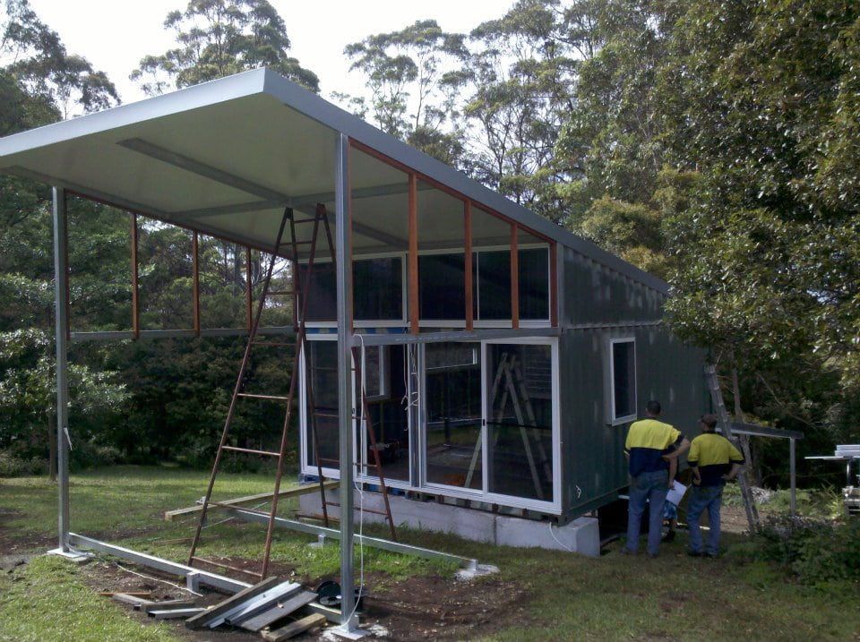 A Group of Men Are Working on a Small House — North Coast Steel Fabrication in South Lismore, NSW
