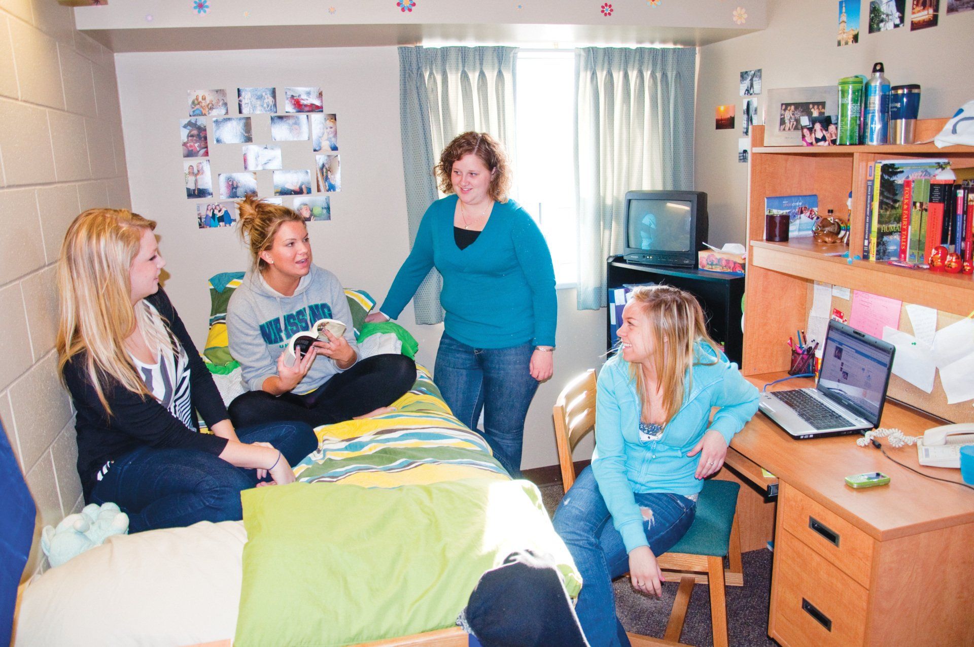 Students hanging out in a residence room
