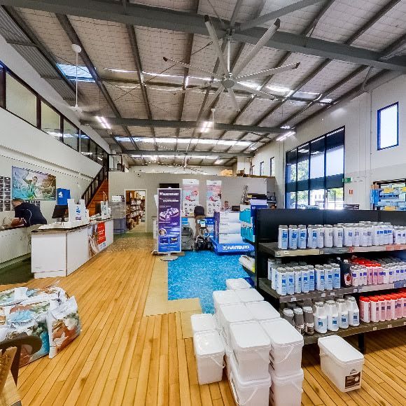 The Inside of a Store Filled With Lots of Products — Poolside Noosa in Noosaville, QLD