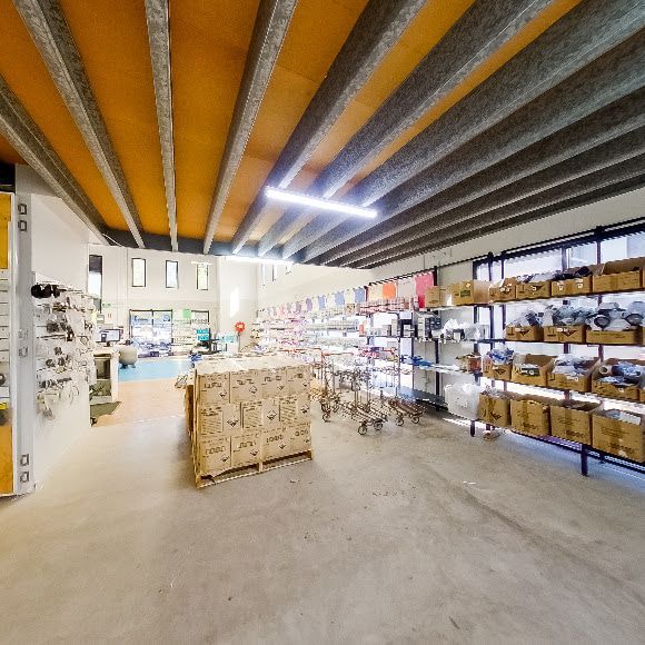 A Large Room With a Lot of Shelves and Boxes on Them — Poolside Noosa in Noosaville, QLD