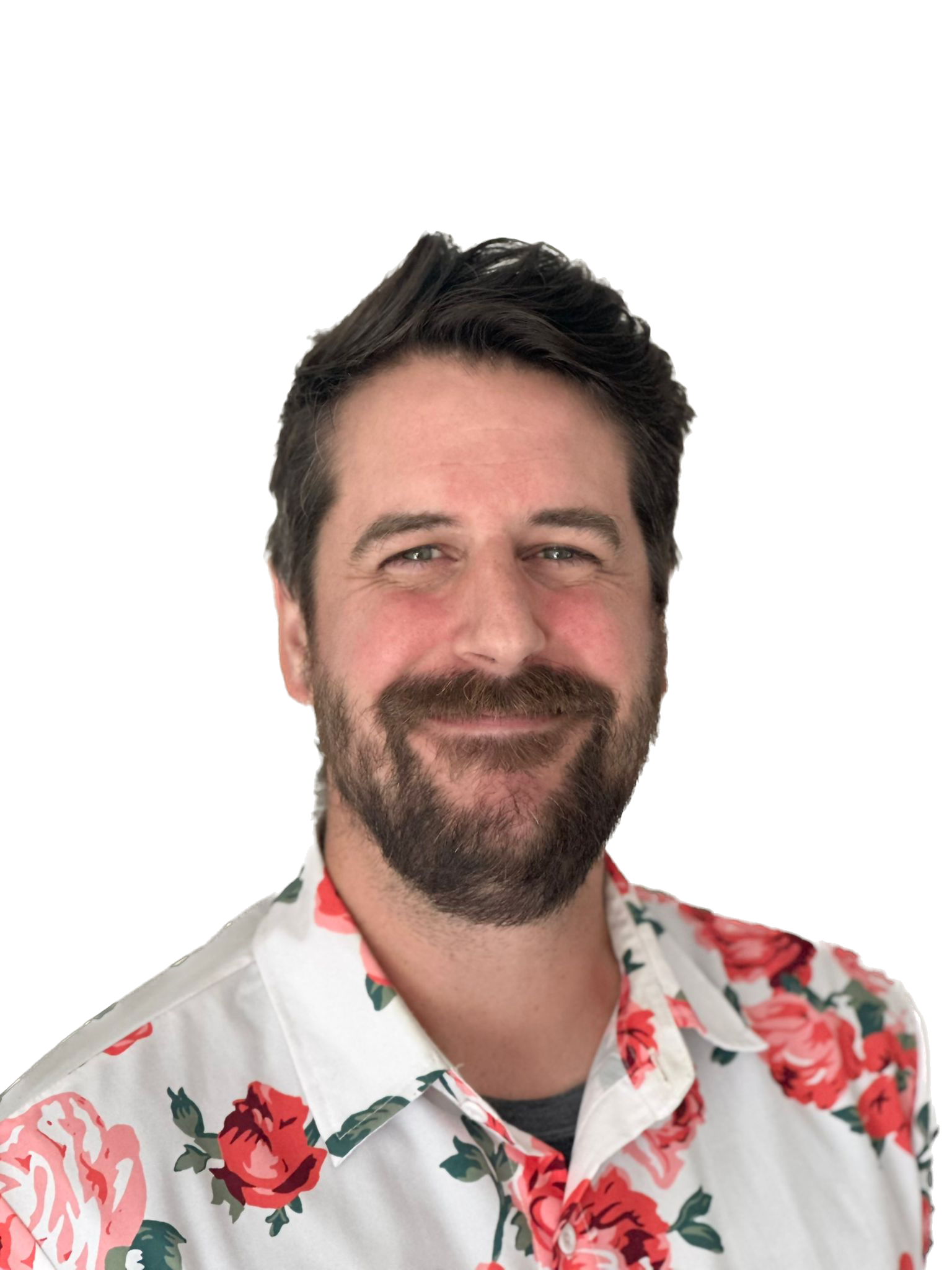 Woman with curly black hair, wearing a tan blouse, smiling, against a white background.