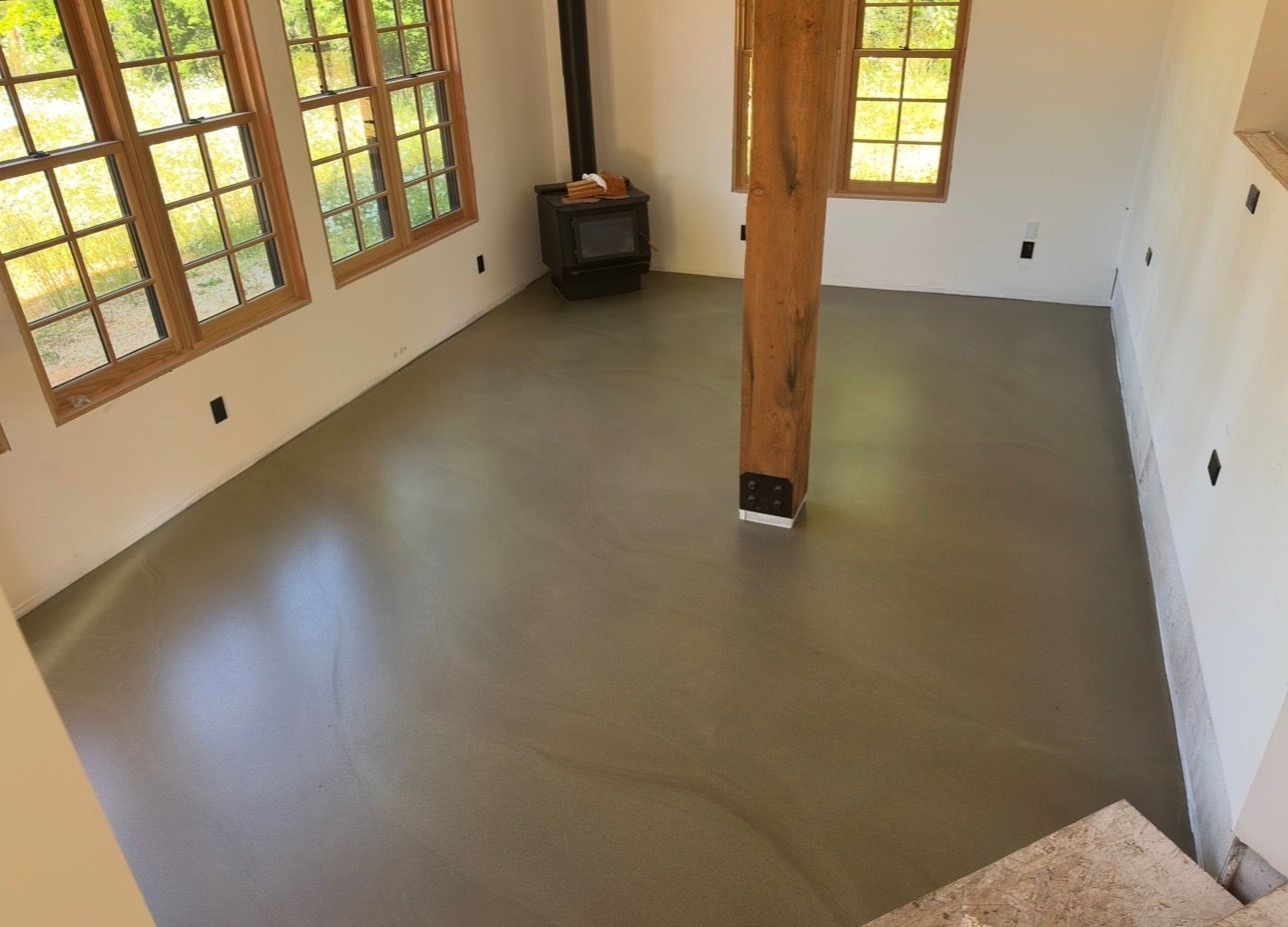 There is a fireplace in the middle of the room.