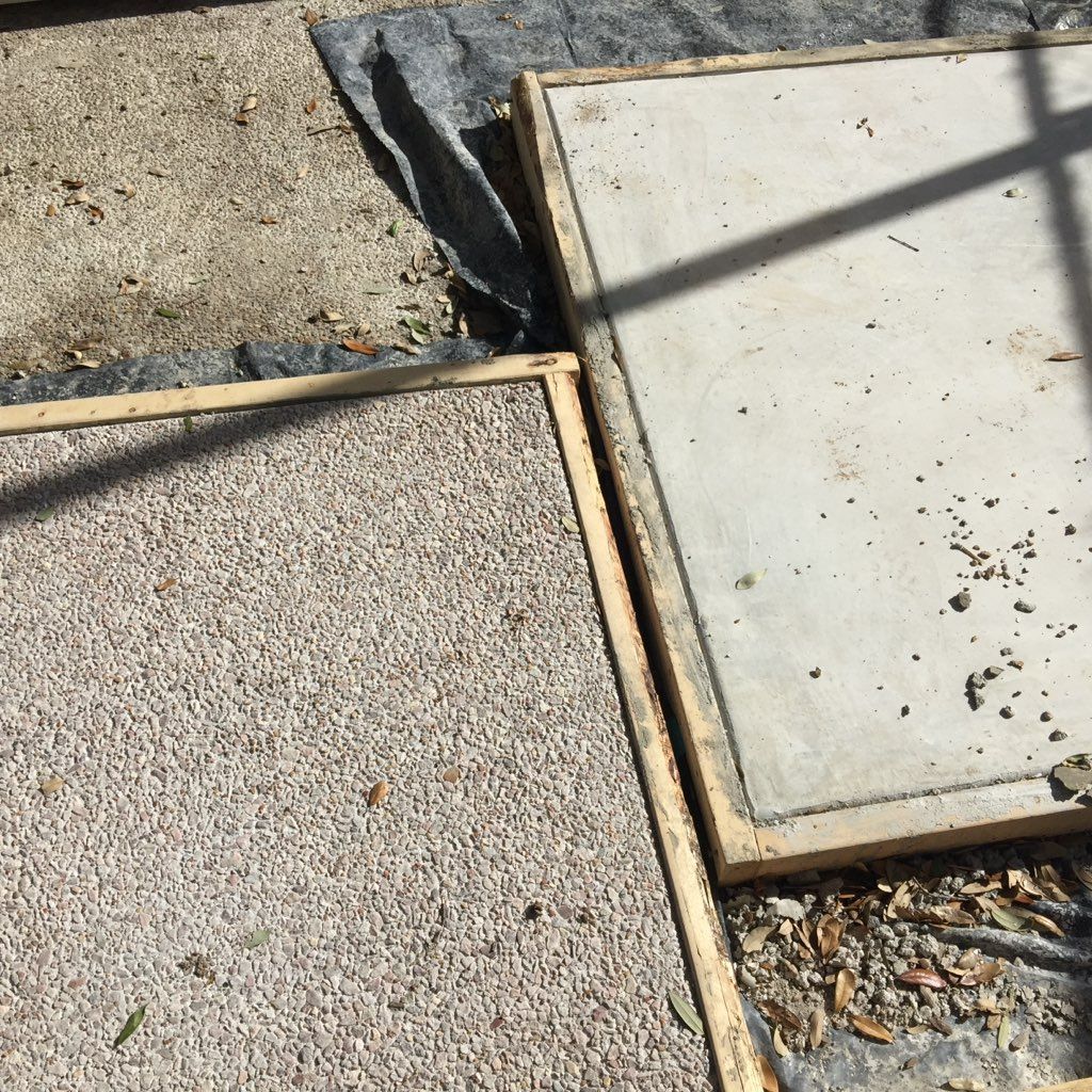 A concrete slab with a wooden frame around it