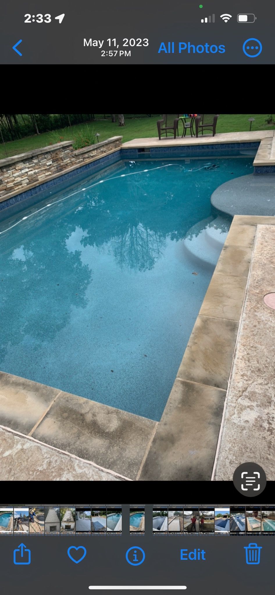 A picture of a swimming pool on a cell phone.