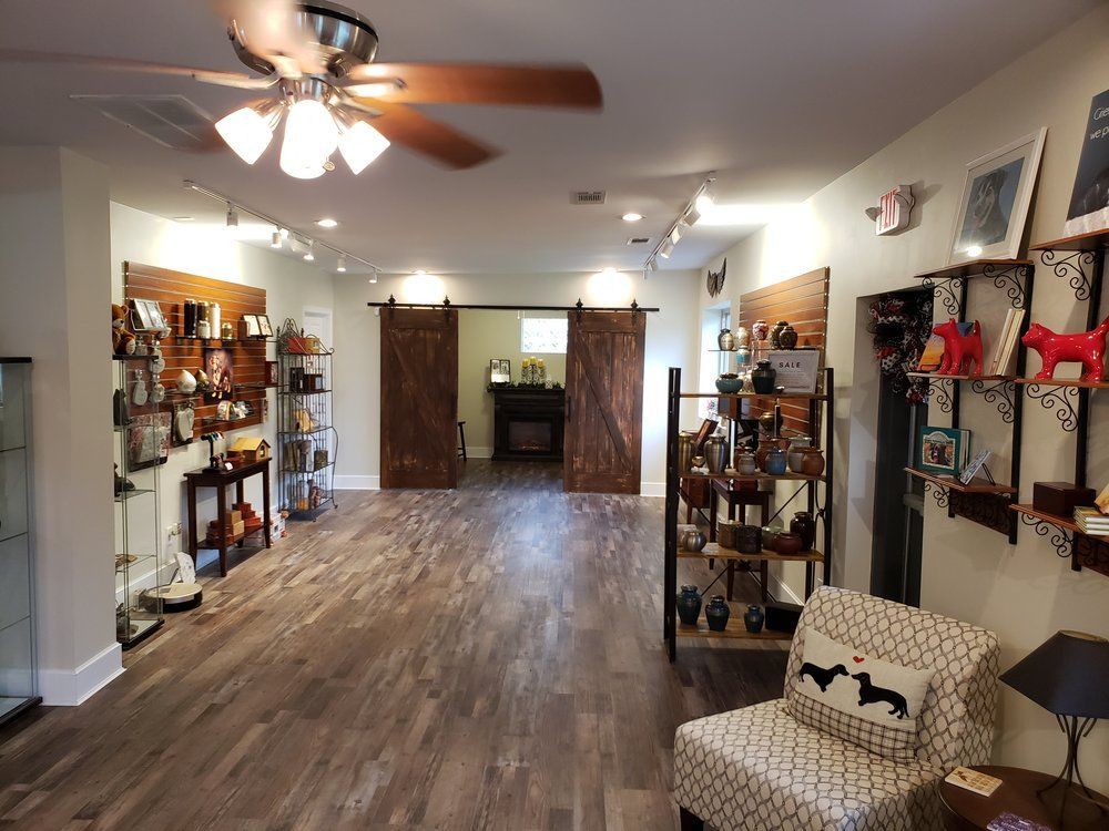 a store with a sliding barn door leading to a storeroom