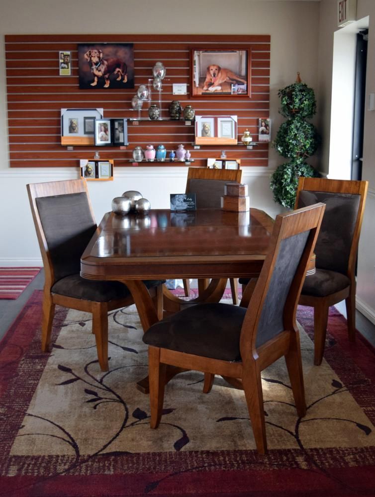 a room with a table and chairs and a sign that says exit