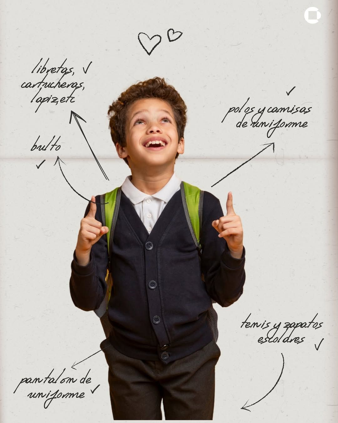 A young boy with a backpack is smiling in a library.
