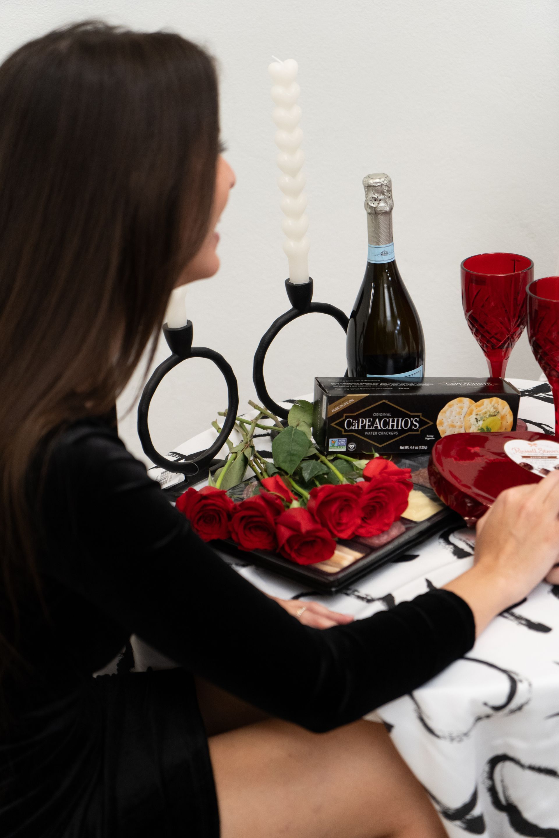San Juan Puerto Rico with historic stone fort and church on a sunny day with blue sky and ocean waves.