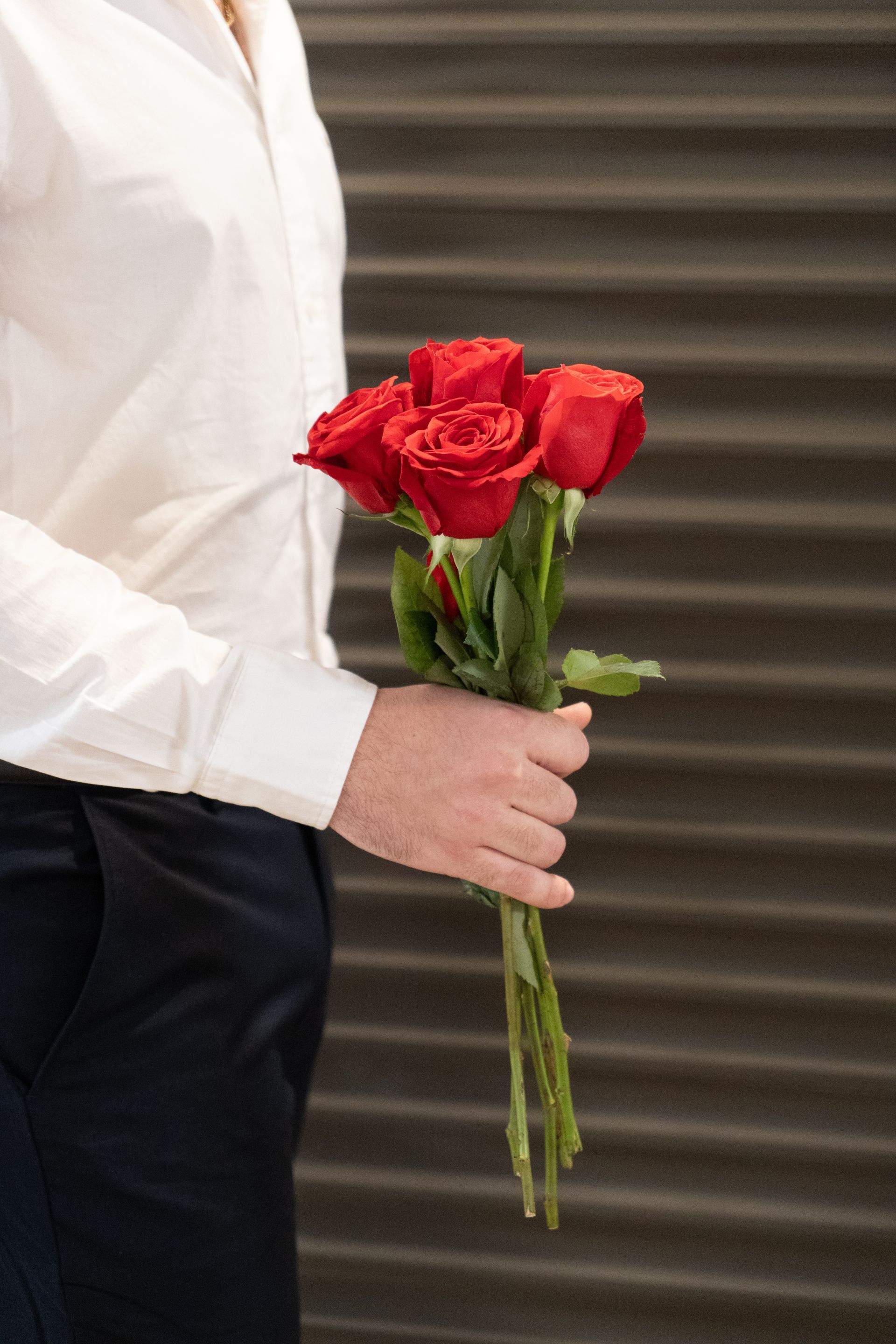 San Juan Puerto Rico with historic stone fort and church on a sunny day with blue sky and ocean waves.