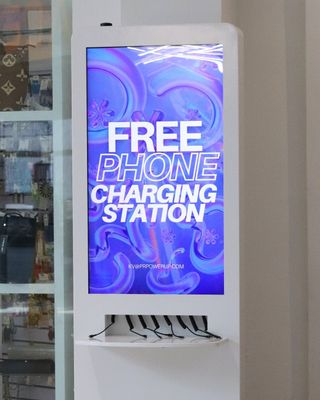 A white digital kiosk displays