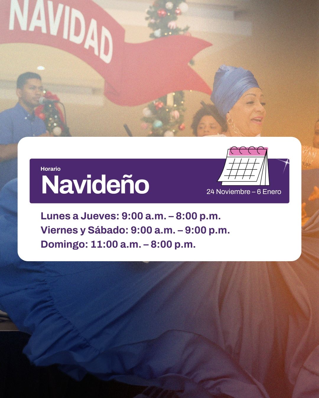 A group of people performing a dance, with a Feliz Navidad banner in front of them.