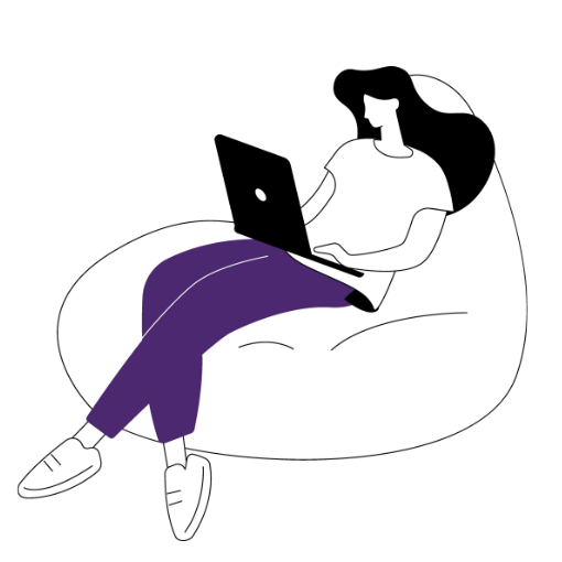 Woman in purple pants on a beanbag, using a laptop.