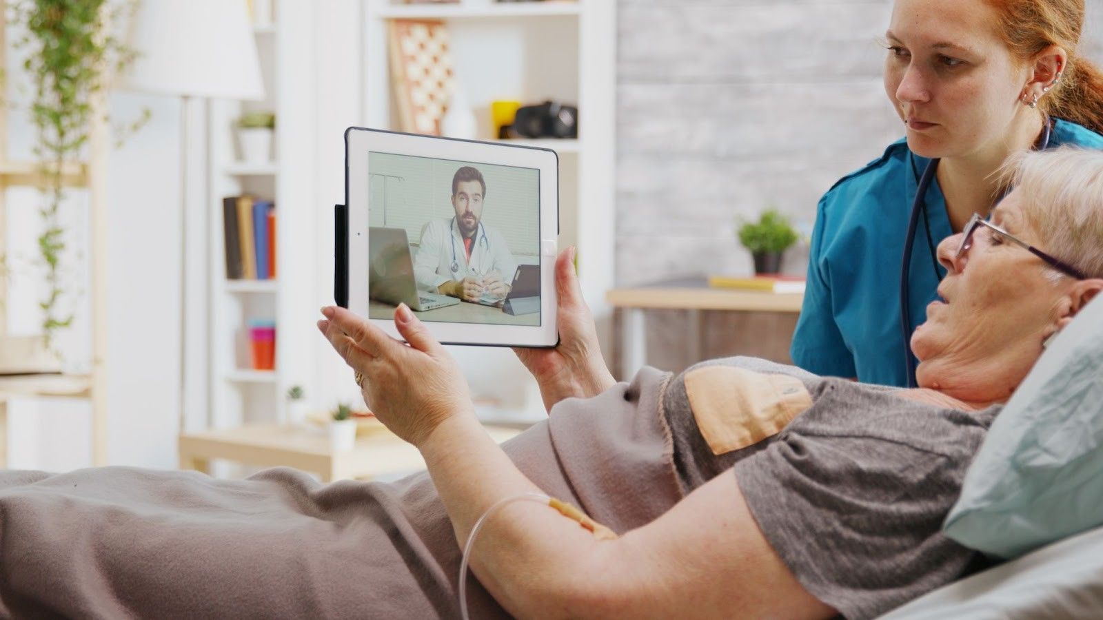 Elderly patient and nurse using tablet for virtual check-up, highlighting opportunities in telehealth jobs Australia