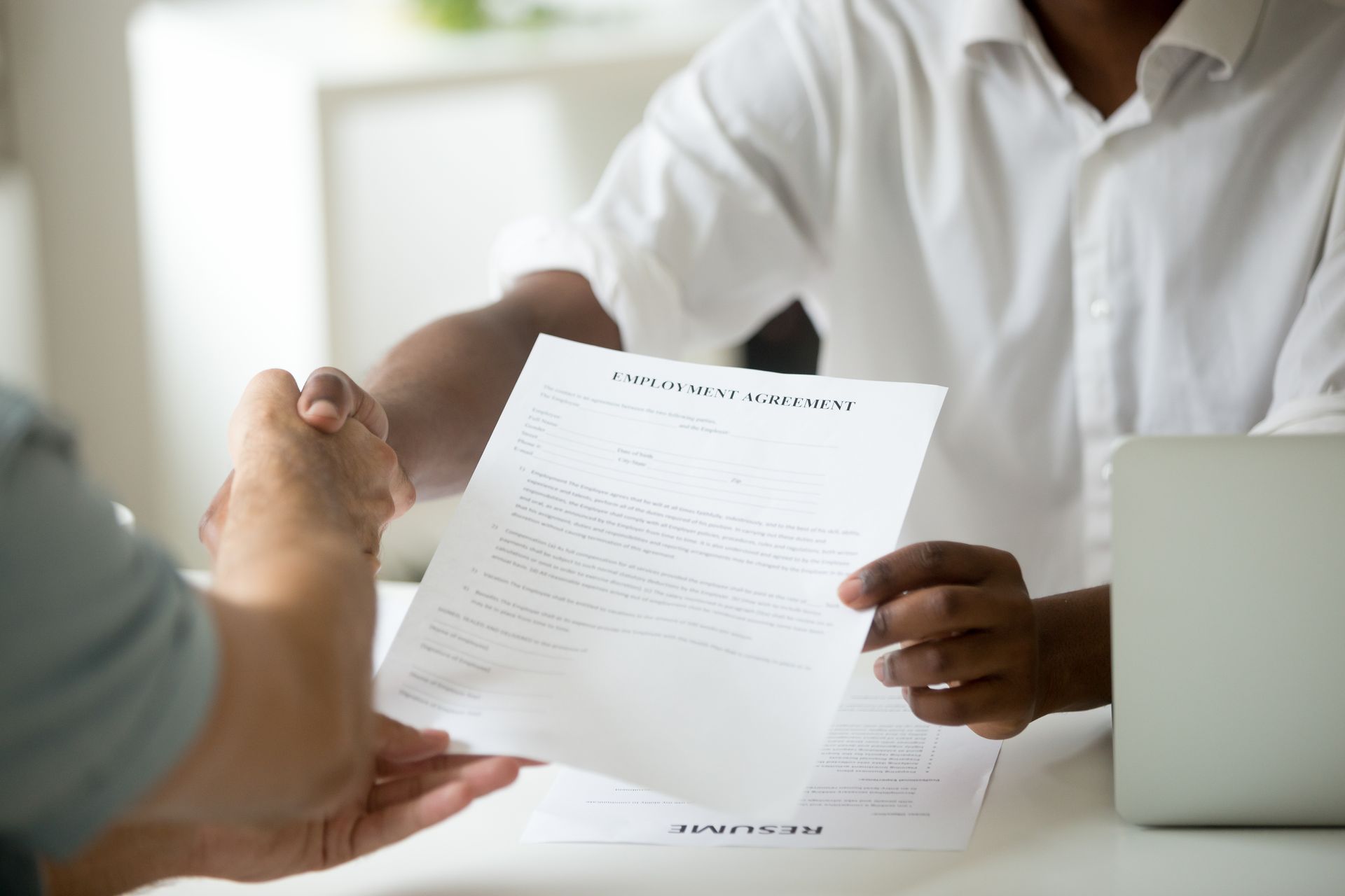 Handshake over employment after agreeing over a short term nursing contract