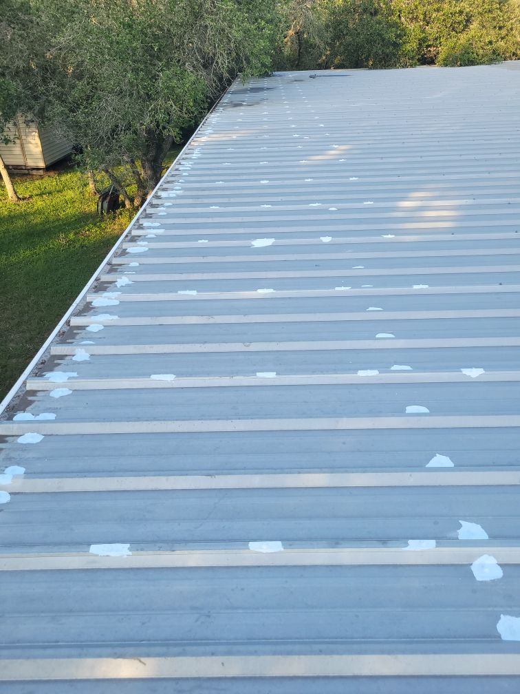 A roof with a lot of white paint on it.