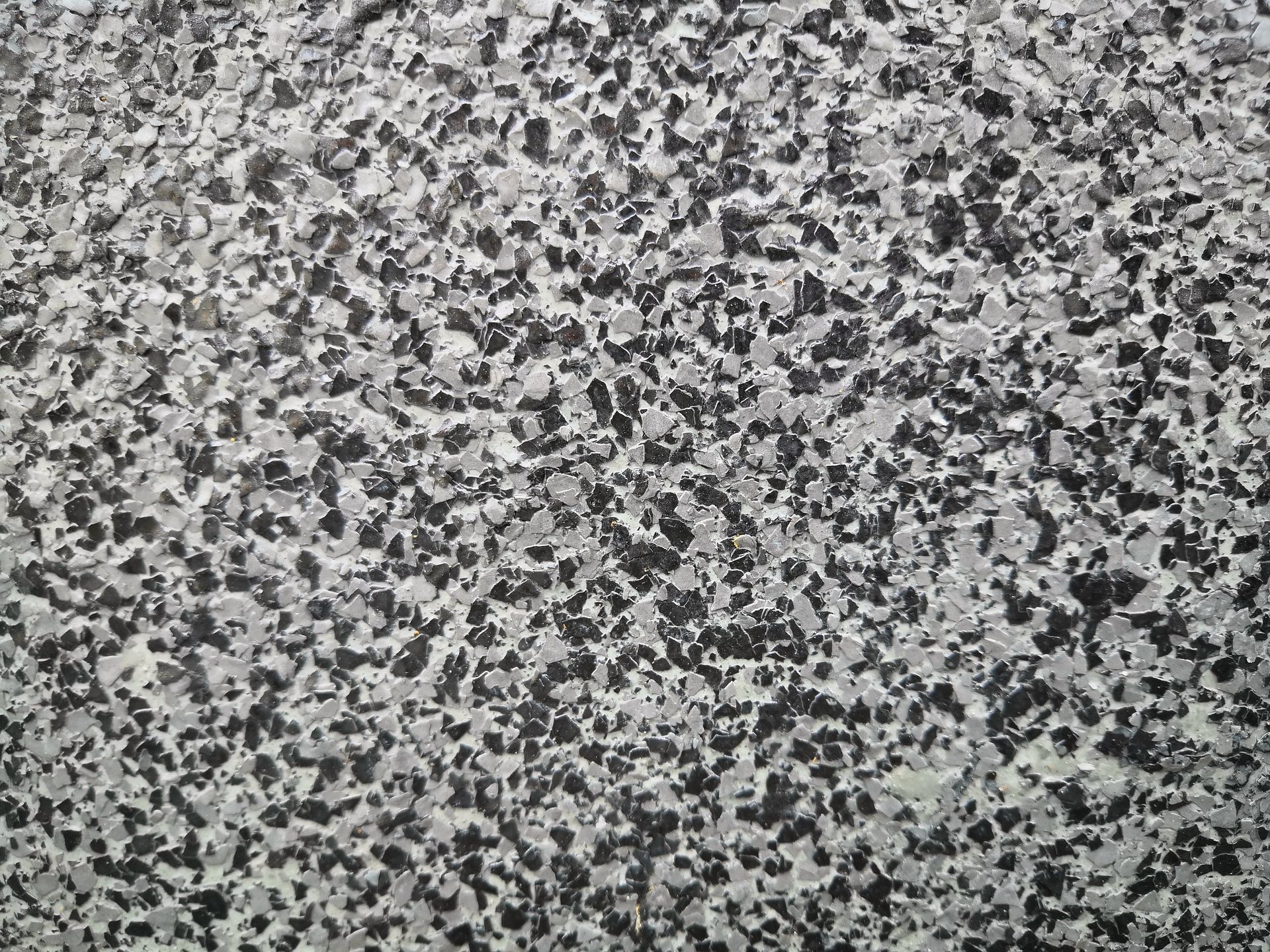 Gray, black, and white speckled granite countertop.
