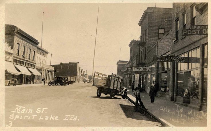 A black and white photo of main street in spirit lake ida