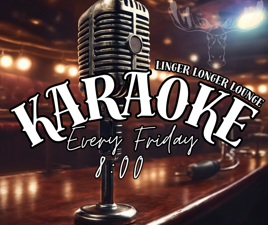 A microphone is sitting on a wooden table with the words karaoke every friday written on it.