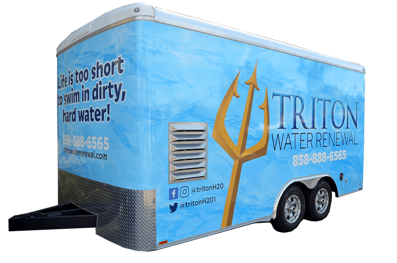 Blue Triton Water Renewal trailer with water drop logo and a “too short” slogan on the side