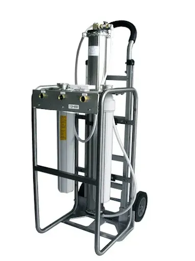 Portable hydraulic lift machine with metal frame, cylinders, hoses, and black wheels on a white background