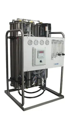 Industrial water treatment filtration system in black metal frame with control panel and gauges