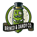 The logo for brined & dandy co. shows a pickle wearing a top hat and bow tie.