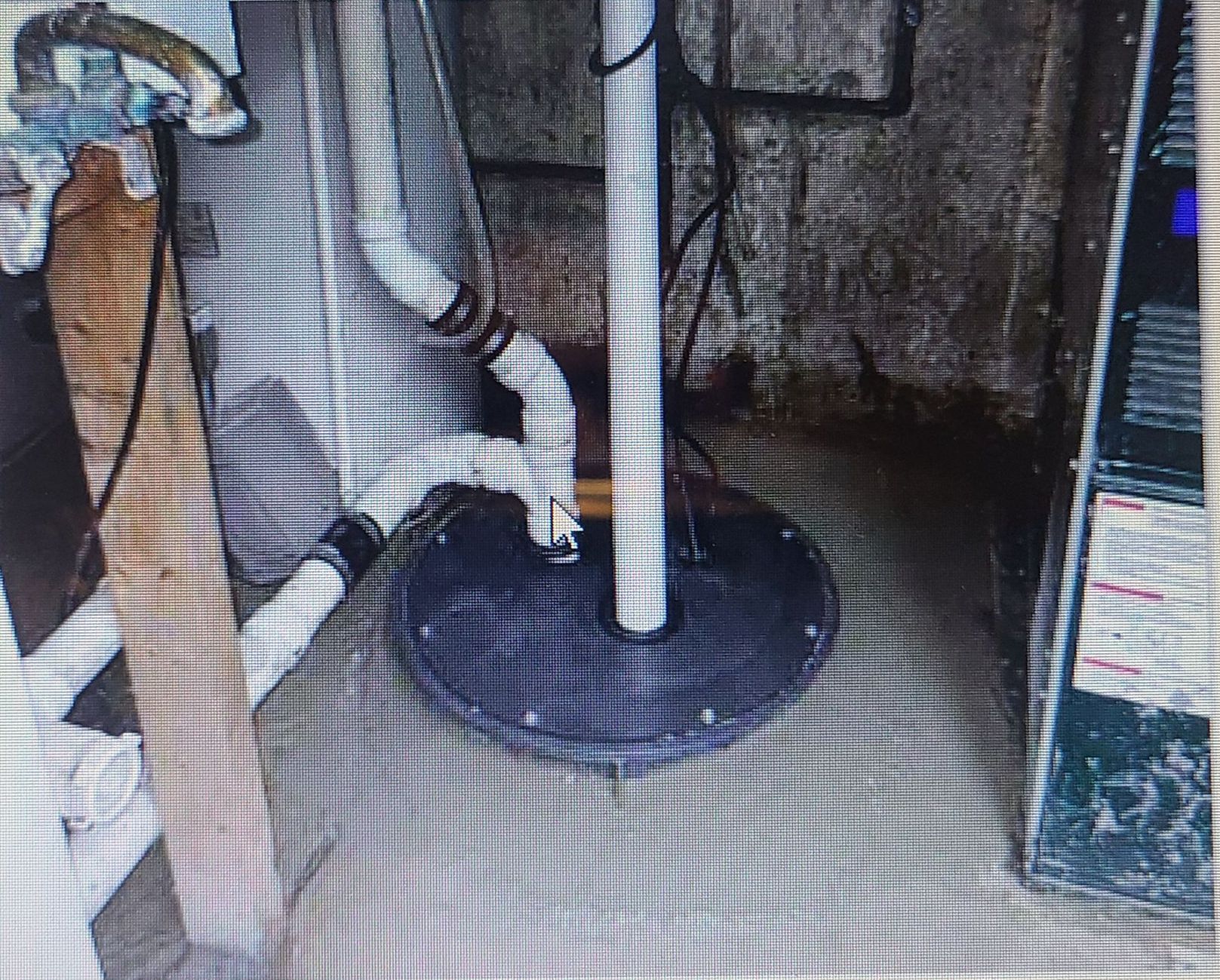 A drainage in the floor.