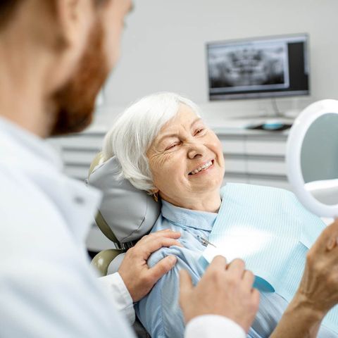 Senior Woman and a Dentist — Hickory, NC — McDonald Family Dentistry