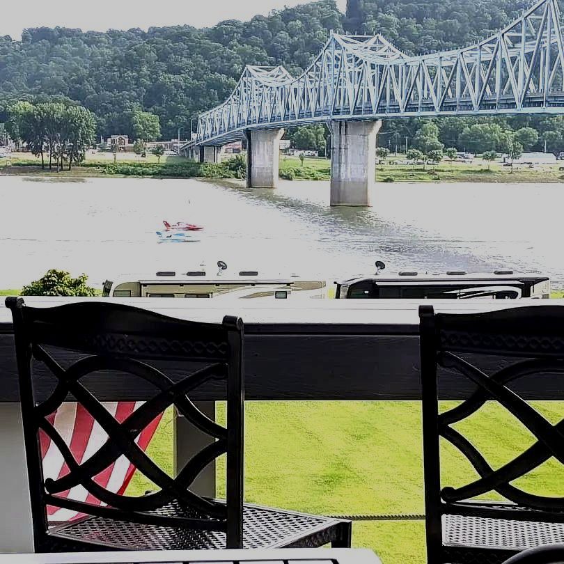 A view of a bridge over a river from a balcony