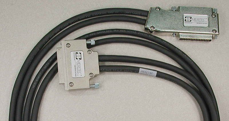 Gray cable assembly with two connectors and three black cables.