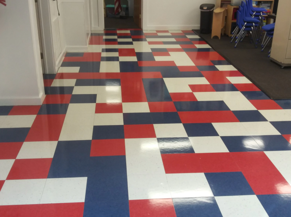 A red white and blue checkered floor in a room