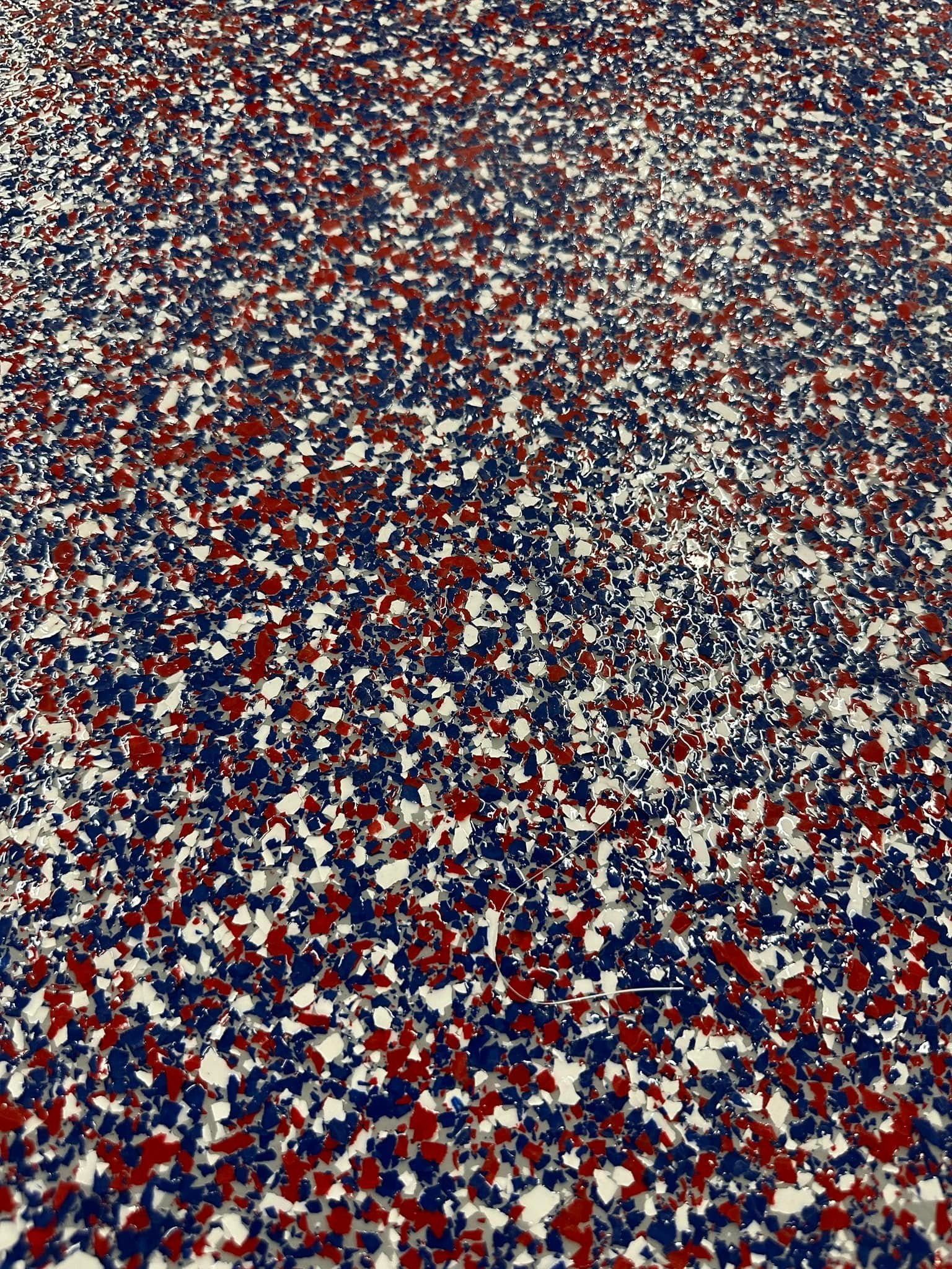 Speckled floor with red, white, and blue chips.