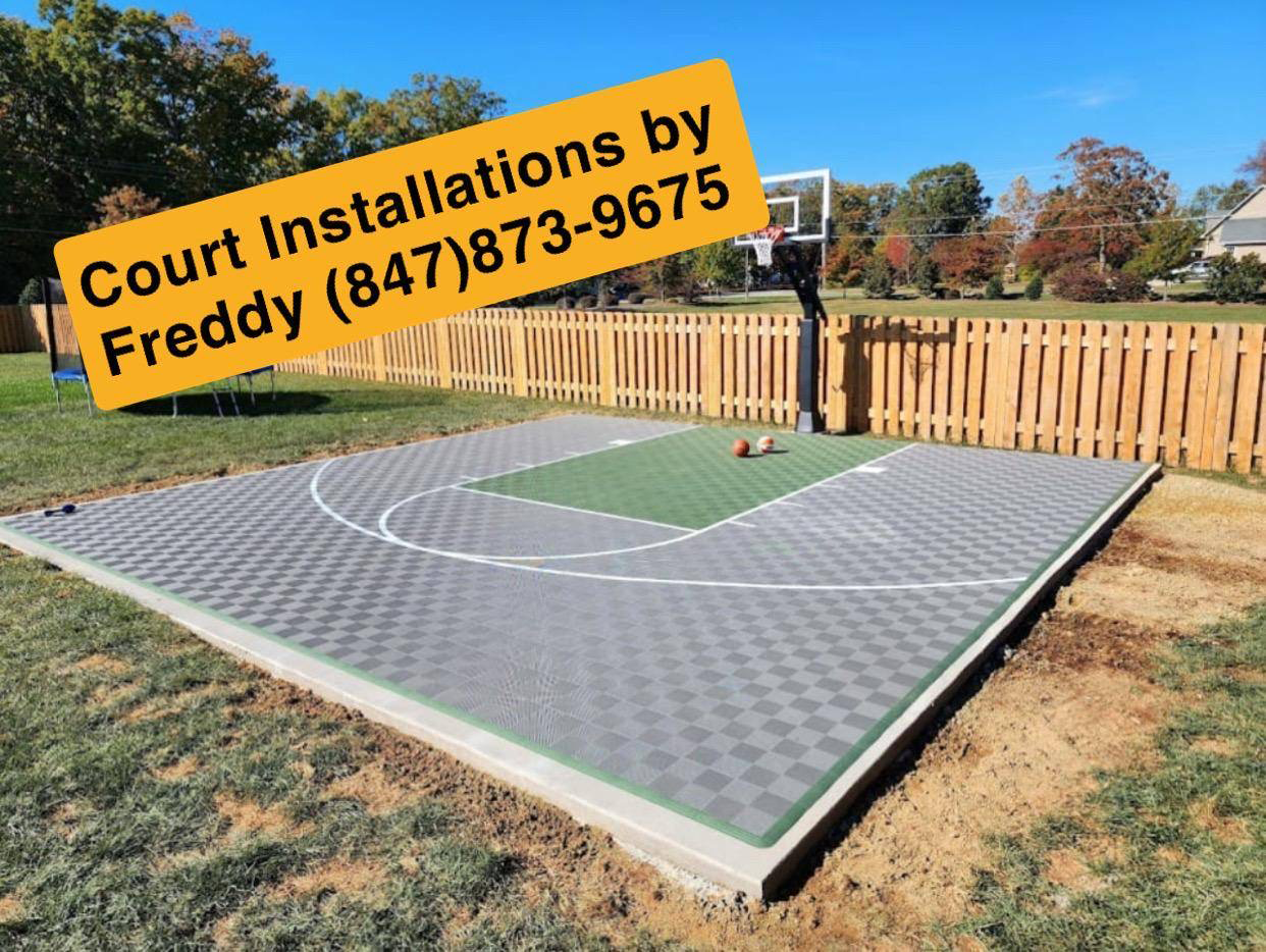 A basketball court with a sign that says court installations by freddy