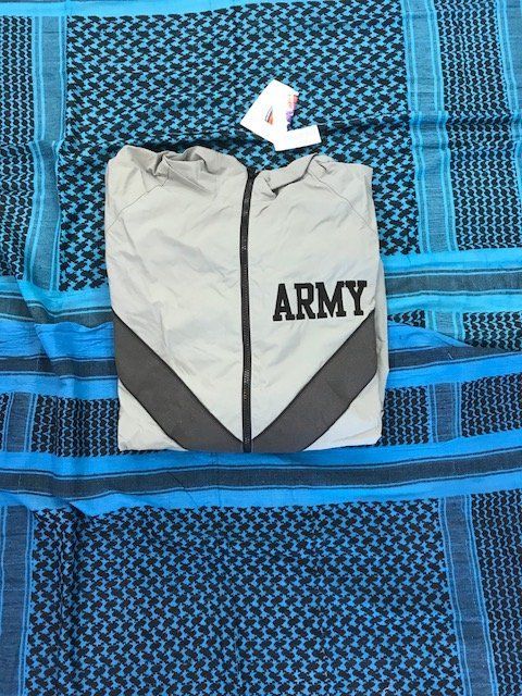 ARMY jackets in stock with tags in them.